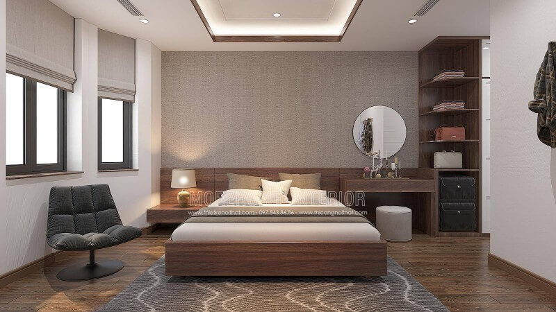 Phòng ngủ tại nhà phố hay biệt thự của bạn không được vuông vắn, bạn vẫn có thể tận dụng lợi thế đó để tạo khoảng thư giãn với chiếc ghế thư giãn êm ái cùng luồng sáng tự nhiên bên cạnh 2 ô cửa luôn chào đón nguồn sinh khí tinh túy từ tự nhiên. Thiết kế nội thất biệt thự