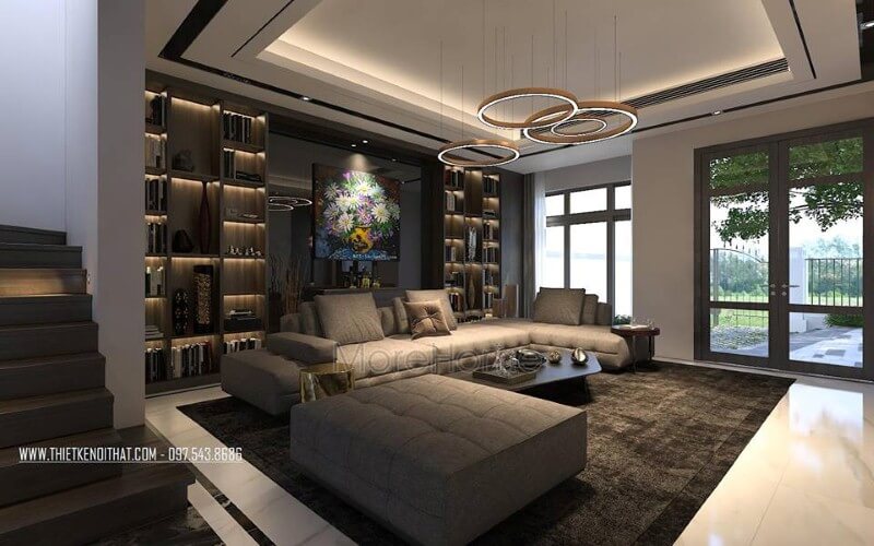 Trang trí nội thất phòng khách ấn tượng với phong cách hiện đại sang trọng cùng sắc trầm chủ đạo. Thiết kế phòng khách biệt thự